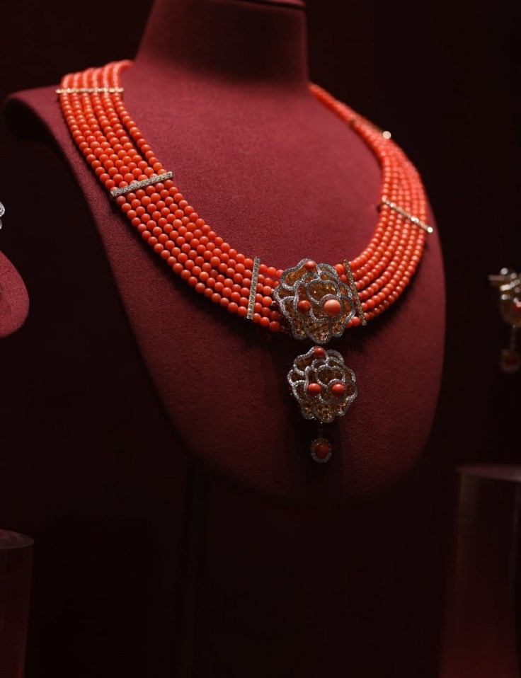 Contemporary Nigerian coral beads with diamonds.